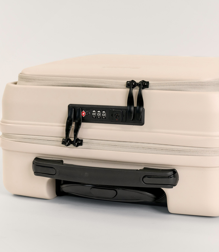 AIRE (Beige) Carry On Suitcase