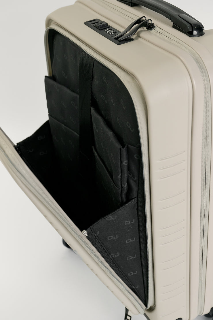 AIRE (Beige) Recycled Carry On Suitcase