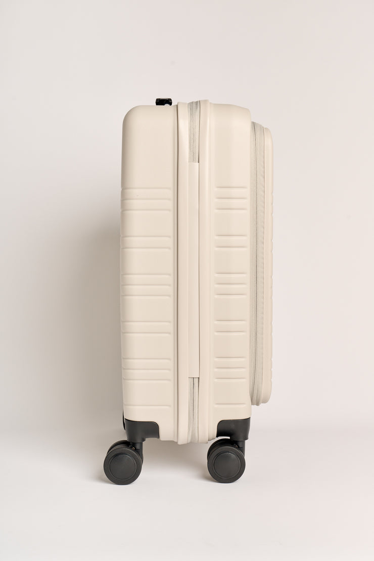 AIRE (Beige) Recycled Carry On Suitcase